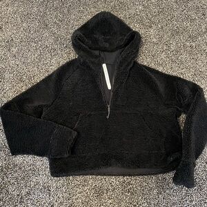 Lululemon black fleece hoodie half zip. Size M/L.  Brand New without tags